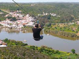 Man on Zipwire at Isla Canela